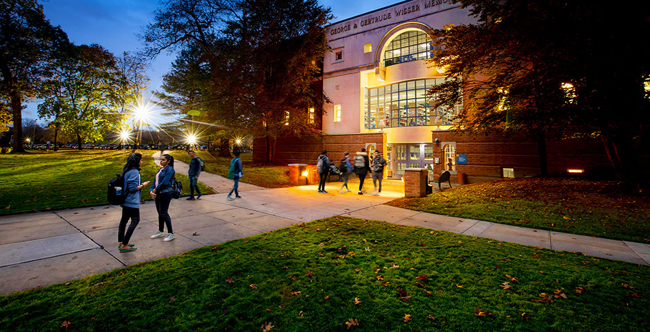 Activity outside Wisser Library at night