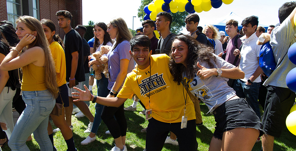 Many people at sports event on the Long Island campus