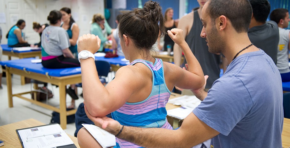 Student test stretching out shoulders