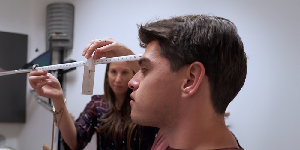 Doctor testing patient's sight.