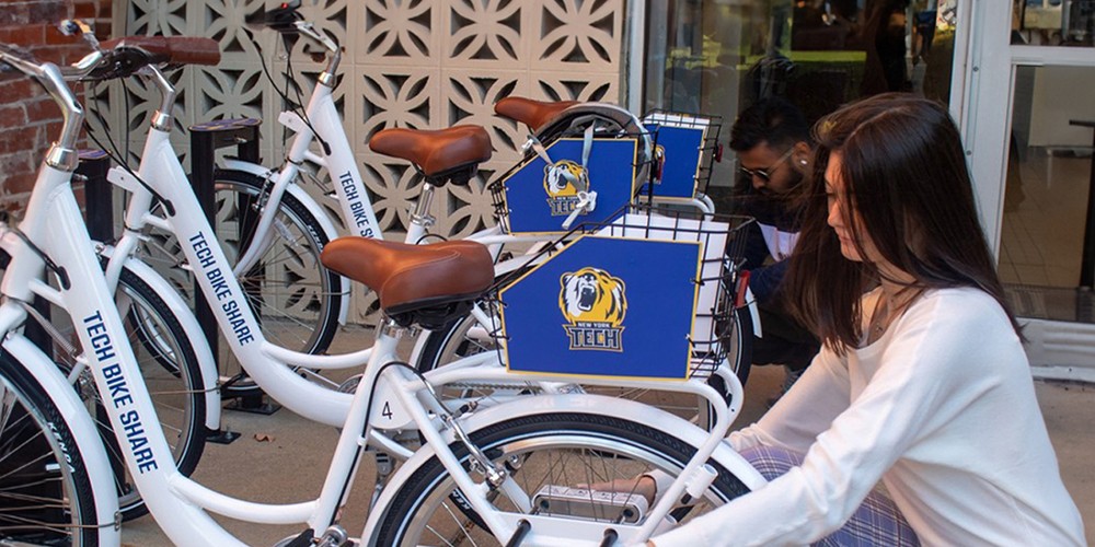 Student using rental bicycle.