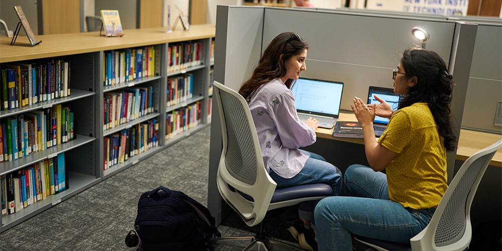 Teacher and student talk together