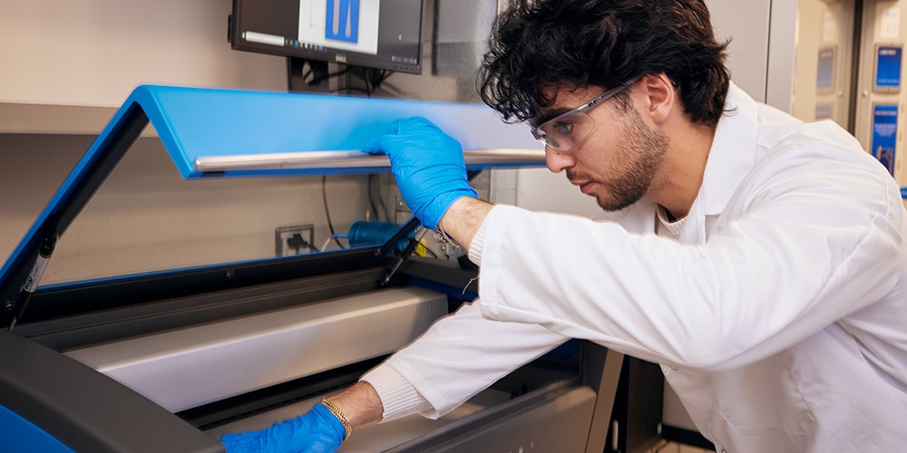 Student using 3D printer