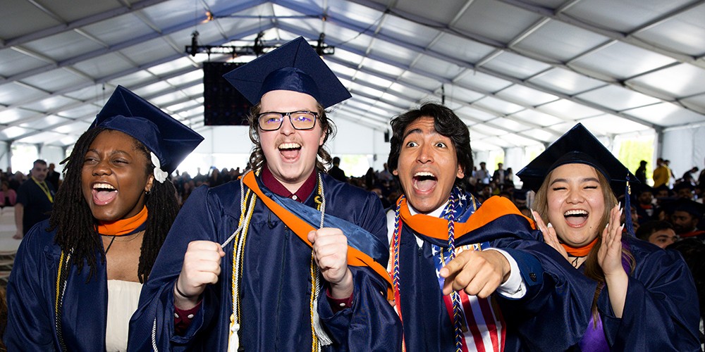 Graduates in academic regalia. 