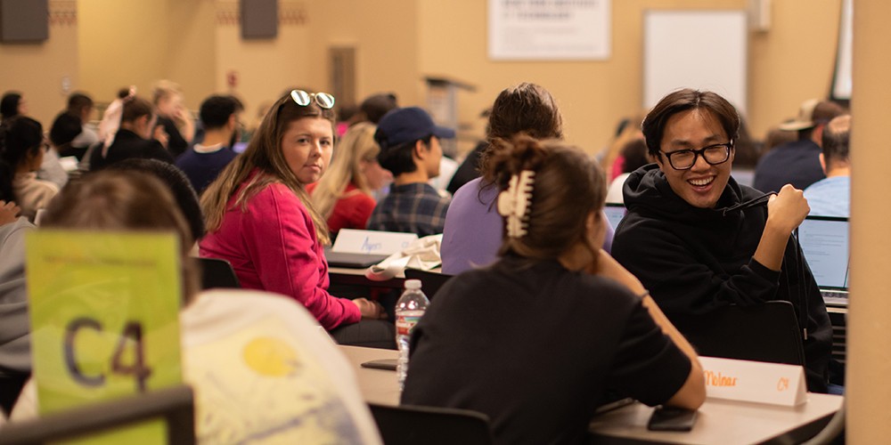 Students talking at table